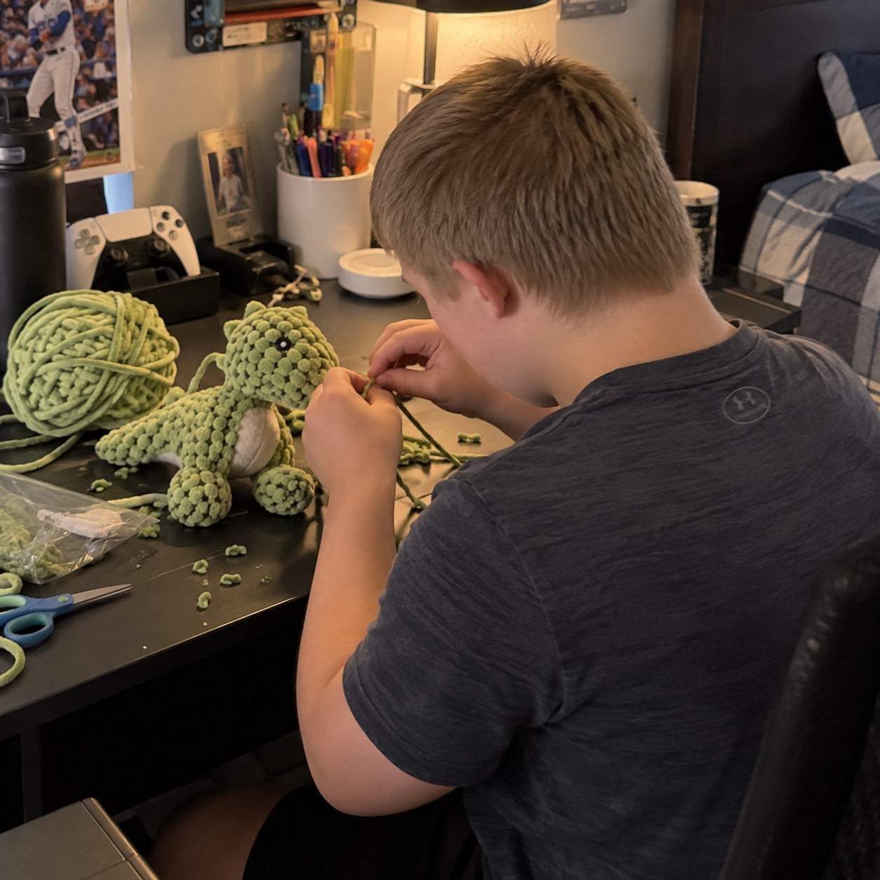 Peter making a green Dino by hand